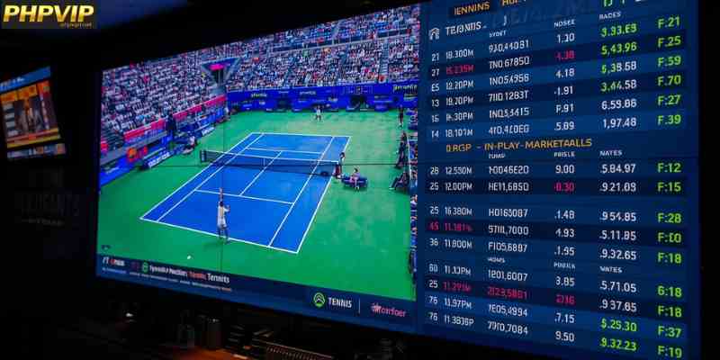 A live tennis match displayed on a screen with dynamic betting odds, highlighting pre-match and in-play markets.